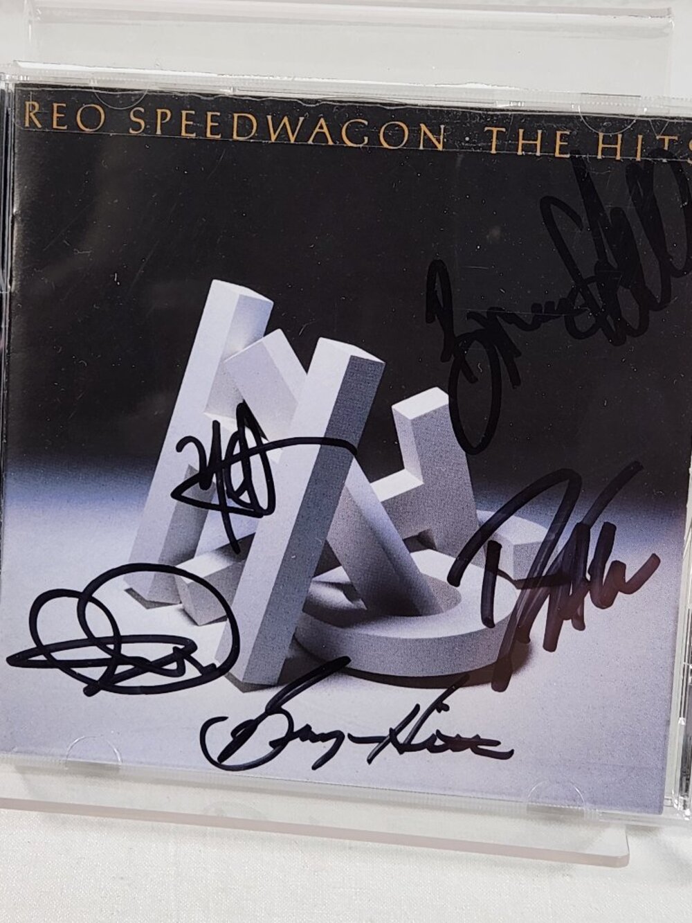 REO Speedwagon Band Autographed The Hits CD - 5 Members Signed Fast Ship